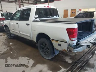 2014 Nissan Titan S with VIN 1N6AA0EC2EN512337, listed as a IAAI auction lot 41337837 with 187,540 mi miles and . Bid and sale history available at DreamBid. Image 3.