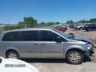 2016 Dodge Grand Caravan SE with VIN 2C4RDGBG9GR385847, listed as a IAAI auction lot 42042755 with 32,613 mi miles and . Bid and sale history available at DreamBid. Image 14.