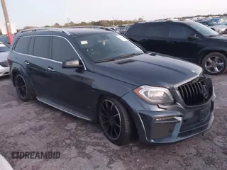 2014 Mercedes-Benz GL-Class GL 550 with VIN 4JGDF7DE9EA329761, listed as a IAAI auction lot 41651533 with 113,056 mi miles. Bid and sale history available at carsss.com. Image 1.