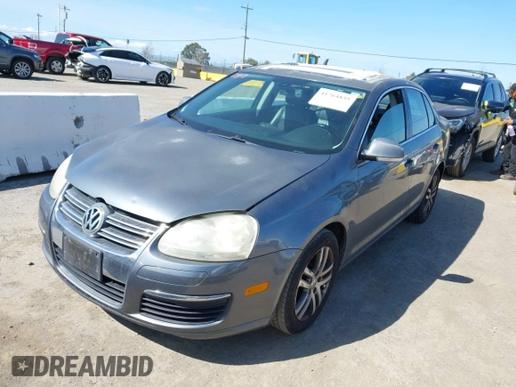 2005 Volkswagen Jetta z VIN 3VWDG71K35M613236, wystawiony jako IAAI lot #41764835 z przebiegiem Nie podano mil oraz . Historia ofert i sprzedaży dostępna na DreamBid. Obrazek 2.