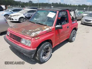 1995 Geo Tracker z VIN 2CNBE18U4S6935826, wystawiony jako IAAI lot #42072913 z przebiegiem 183 092 mil mil oraz . Historia ofert i sprzedaży dostępna na DreamBid. Obrazek 2.