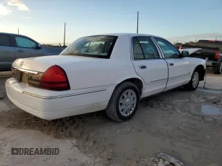 2006 Mercury Grand Marquis GS z VIN 2MEFM74V26X621309, wystawiony jako Copart lot #76454214 z przebiegiem 59 171 mil mil oraz Szkoda całkowita • Salvage title. Historia ofert i sprzedaży dostępna na DreamBid. Obrazek 3.