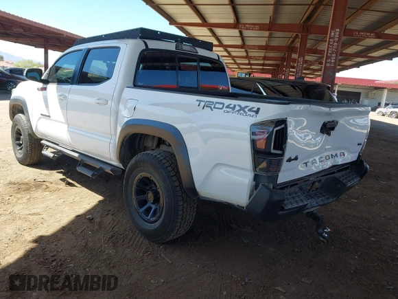 2016 Toyota Tacoma SR with VIN 5TFCZ5ANXGX028464, listed as a IAAI auction lot 41834385 with 124,407 mi miles and . Bid and sale history available at DreamBid. Image 3.