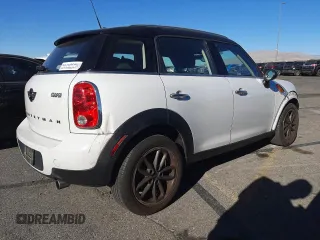2015 MINI Countryman with VIN WMWZB3C53FWR45084, listed as a Copart auction lot 44647995 with 101,423 mi miles and Salvage Title. Bid and sale history available at DreamBid. Image 3.
