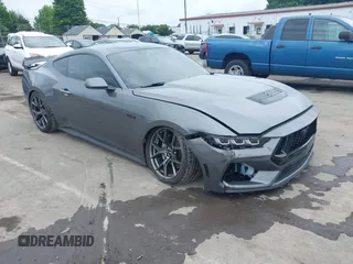 2024 Ford Mustang GT with VIN 1FA6P8CF8R5411835, listed as a IAAI auction lot 42331556 with 26,526 mi miles and . Bid and sale history available at DreamBid. Image 1.