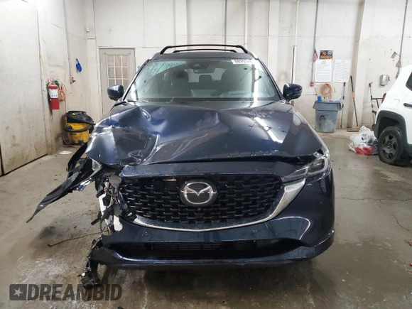 2023 Mazda CX-5 Signature with VIN JM3KFBXY9P0122887, listed as a Copart auction lot 88993465 with 12,116 mi miles and Salvage Title. Bid and sale history available at carsss.com. Image 5.