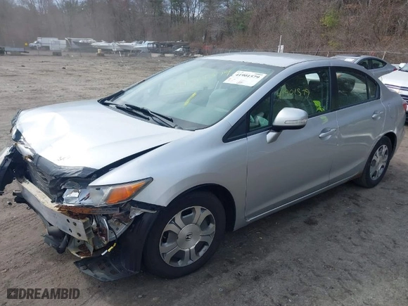 2012 Honda Civic Hybrid with VIN JHMFB4F21CS008894, listed as a IAAI auction lot 41901579 with 336,630 mi miles. Bid and sale history available at carsss.com. Image 2.