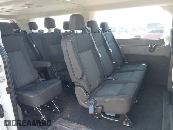 2023 Ford Transit Passenger XL with VIN 1FBAX2Y8XPKB41098, listed as a IAAI auction lot 42218691 with 28,891 mi miles and . Bid and sale history available at DreamBid. Image 8.