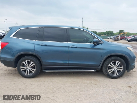 2017 Honda Pilot EX-L with VIN 5FNYF5H88HB042003, listed as a IAAI auction lot 42296542 with 172,823 mi miles and . Bid and sale history available at DreamBid. Image 13.