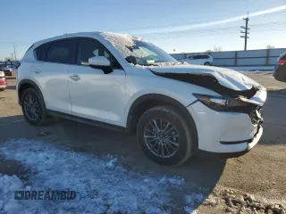 2021 Mazda CX-5 Touring with VIN JM3KFBCM9M0336910, listed as a Copart auction lot 48032275 with 65,515 mi miles and Salvage Title. Bid and sale history available at carsss.com. Image 4.