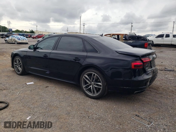 2017 Audi A8 with VIN WAU44AFD7HN010560, listed as a Copart auction lot 60020315 with 86,260 mi miles and Salvage title. Bid and sale history available at DreamBid. Image 2.