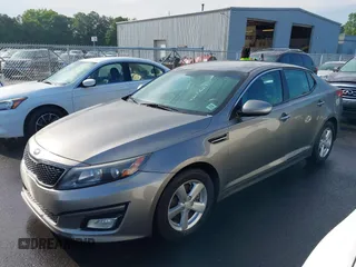 2015 Kia Optima LX z VIN 5XXGM4A70FG393771, wystawiony jako IAAI lot #42273627 z przebiegiem 235 902 mil mil oraz . Historia ofert i sprzedaży dostępna na DreamBid. Obrazek 2.