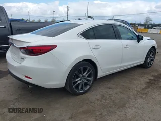 2017 Mazda 6 Grand Touring with VIN JM1GL1X57H1118646, listed as a IAAI auction lot 41896459 with 105,768 mi miles and . Bid and sale history available at carsss.com. Image 4.