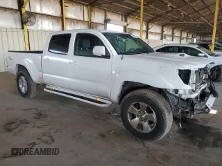 2005 Toyota Tacoma PreRunner with VIN 3TMKU72N15M003377, listed as a Copart auction lot 58870615 with 235,816 mi miles and Salvage title. Bid and sale history available at DreamBid. Image 4.