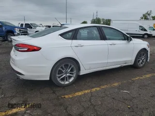 2017 Ford Fusion SE z VIN 3FA6P0H72HR241423, wystawiony jako Copart lot #56777945 z przebiegiem 105 223 mil mil oraz Czysty tytuł • Clean title. Historia ofert i sprzedaży dostępna na DreamBid. Obrazek 3.
