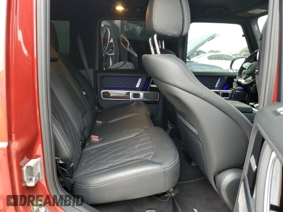 2023 Mercedes-Benz G 63 AMG z VIN W1NYC7HJ2PX469228, wystawiony jako Copart lot #51649585 z przebiegiem 13 876 mil mil oraz Szkoda całkowita • Salvage title. Historia ofert i sprzedaży dostępna na DreamBid. Obrazek 10.
