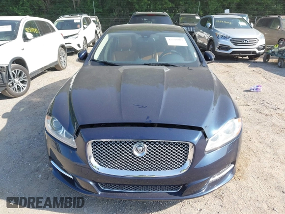2013 Jaguar XJ Supercharged with VIN SAJWA2GE8DMV43164, listed as a IAAI auction lot 42549807 with 59,744 mi miles and . Bid and sale history available at DreamBid. Image 6.