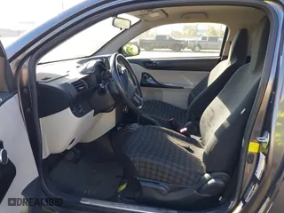 2012 Scion iQ with VIN JTNJJXB07CJ017296, listed as a IAAI auction lot 41636769 with 94,333 mi miles. Bid and sale history available at carsss.com. Image 5.