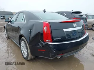 2012 Cadillac CTS with VIN 1G6DC5E54C0146550, listed as a IAAI auction lot 41735872 with 119,784 mi miles and . Bid and sale history available at DreamBid. Image 3.