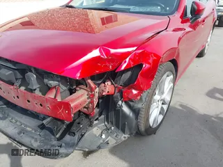 2017 Mazda Mazda6 Touring with VIN JM1GL1V56H1155982, listed as a IAAI auction lot 42055447 with 59,566 mi miles. Bid and sale history available at carsss.com. Image 6.