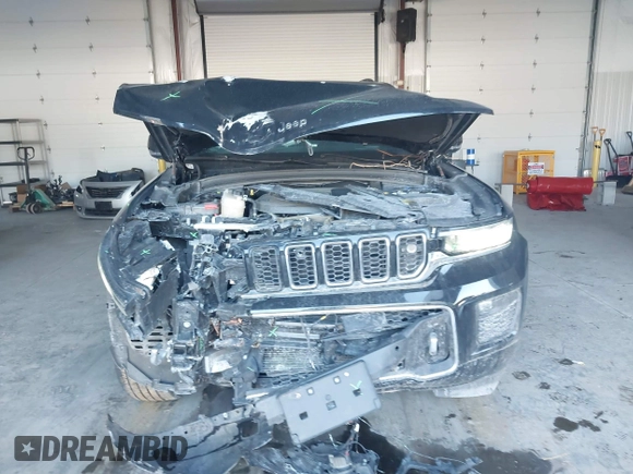 2023 Jeep Grand Cherokee Overland with VIN 1C4RJHDG5PC507978, listed as a IAAI auction lot 41394199 with 57,323 mi miles and . Bid and sale history available at DreamBid. Image 12.