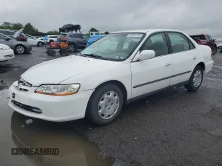 1999 Honda Accord LX с VIN JHMCG6653XC000094, выставлен на аукционе Copart как лот 56649755 с пробегом 56 791 миль миль и Списание • Salvage title. История ставок и продаж доступна на DreamBid. Изображение 1.