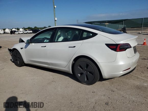 2021 Tesla Model 3 Standard Range Plus with VIN 5YJ3E1EA4MF089259, listed as a Copart auction lot 75398924 with 32,166 mi miles and Salvage Title. Bid and sale history available at DreamBid. Image 2.