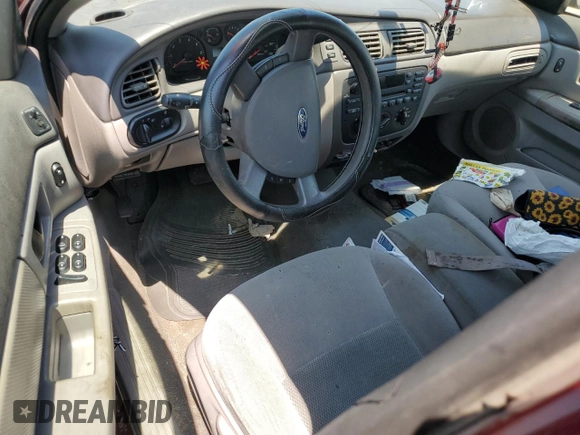 2006 Ford Taurus SE с VIN 1FAFP53286A257593, выставлен на аукционе Copart как лот 62270255 с пробегом Не указан миль и На запчасти • Non repairable. История ставок и продаж доступна на DreamBid. Изображение 8.