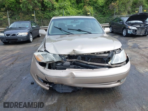 2004 Toyota Avalon XL with VIN 4T1BF28B44U384366, listed as a IAAI auction lot 42080614 with 250,291 mi miles and . Bid and sale history available at carsss.com. Image 12.