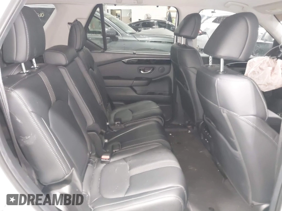 2025 Honda Pilot EX-L with VIN 5FNYG1H41SB045061, listed as a IAAI auction lot 41571217 with 7,971 mi miles and . Bid and sale history available at DreamBid. Image 8.