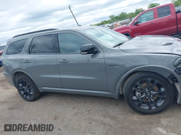 2023 Dodge Durango R/T with VIN 1C4SDJCT5PC551011, listed as a IAAI auction lot 42336477 with 39,754 mi miles and . Bid and sale history available at DreamBid. Image 13.