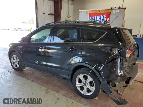 2013 Ford Escape SE with VIN 1FMCU9GXXDUC10995, listed as a Copart auction lot 62347185 with 131,631 mi miles and Salvage title. Bid and sale history available at DreamBid. Image 2.