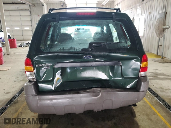 2002 Ford Escape XLS Value with VIN 1FMYU01B32KC48043, listed as a Copart auction lot 63011005 with 167,185 mi miles and Salvage title. Bid and sale history available at DreamBid. Image 6.