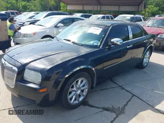 2007 Chrysler 300 with VIN 2C3LA43R57H875094, listed as a IAAI auction lot 42059007 with 125,067 mi miles. Bid and sale history available at carsss.com. Image 2.
