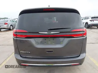 2021 Chrysler Pacifica Touring L z VIN 2C4RC1BG3MR574439, wystawiony jako IAAI lot #42190695 z przebiegiem 104 188 mil mil oraz . Historia ofert i sprzedaży dostępna na DreamBid. Obrazek 16.