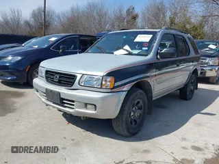 1999 Honda Passport LX with VIN 4S6CK58W3X4423948, listed as a IAAI auction lot 41578294 with 279,429 mi miles. Bid and sale history available at carsss.com. Image 2.