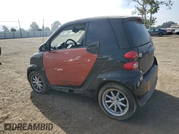 2014 Smart fortwo Pure z VIN WMEEJ3BA1EK753320, wystawiony jako Copart lot #55665555 z przebiegiem 71 305 mil mil oraz Szkody całkowita. Historia ofert i sprzedaży dostępna na DreamBid. Obrazek 2.