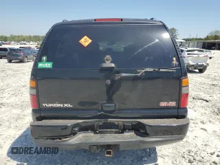 2006 GMC Yukon XL with VIN 1GKFK66U46J165428, listed as a Copart auction lot 52756205 with Not provided miles and Salvage title. Bid and sale history available at DreamBid. Image 6.