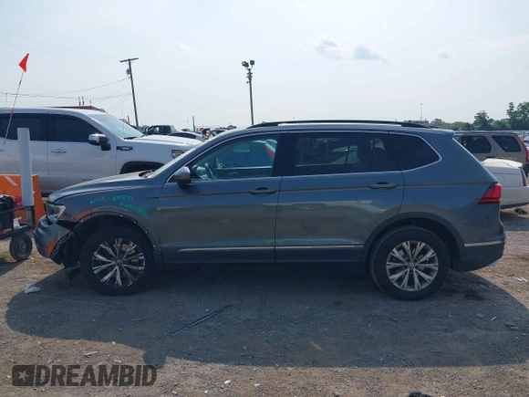 2018 Volkswagen Tiguan SEL с VIN 3VV3B7AX7JM092168, выставлен на аукционе IAAI как лот 42403883 с пробегом 96 022 миль миль и . История ставок и продаж доступна на DreamBid. Изображение 14.