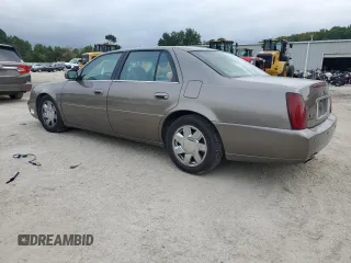2000 Cadillac DeVille DTS z VIN 1G6KF5794YU249059, wystawiony jako Copart lot #71614494 z przebiegiem 121 611 mil mil oraz Szkoda całkowita • Salvage title. Historia ofert i sprzedaży dostępna na DreamBid. Obrazek 2.