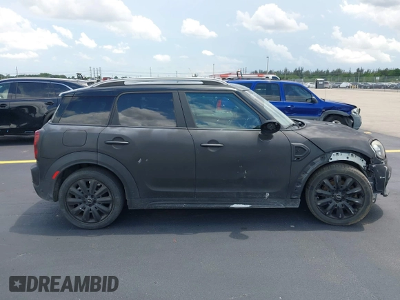 2018 MINI Countryman Cooper S z VIN WMZYT3C35J3E00804, wystawiony jako IAAI lot #42194381 z przebiegiem 101 634 mil mil oraz . Historia ofert i sprzedaży dostępna na DreamBid. Obrazek 13.