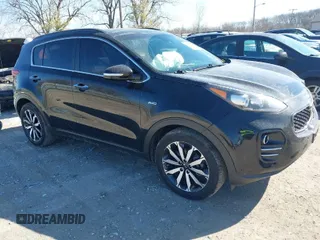 2018 Kia Sportage EX with VIN KNDPNCAC9J7324292, listed as a IAAI auction lot 41859338 with 124,519 mi miles and . Bid and sale history available at carsss.com. Image 1.