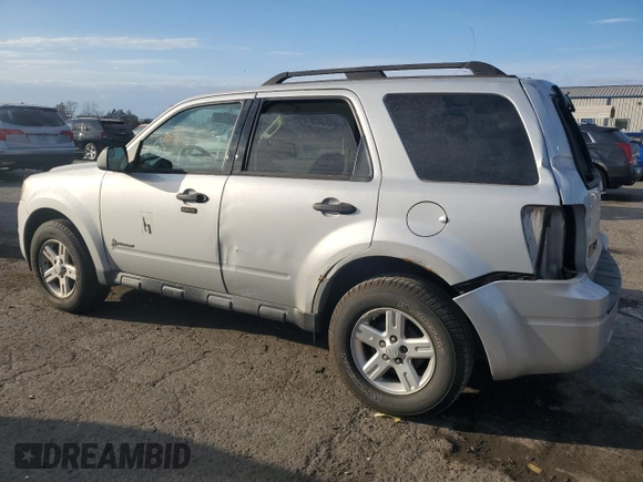 2012 Ford Escape Hybrid с VIN 1FMCU5K37CKA30865, выставлен на аукционе Copart как лот 79235264 с пробегом 140 112 миль миль и Списание • Salvage title. История ставок и продаж доступна на DreamBid. Изображение 2.