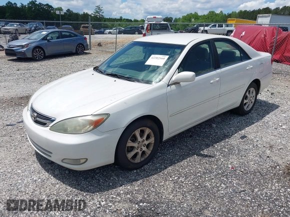 2004 Toyota Camry LE with VIN JTDBE32KX40279599, listed as a IAAI auction lot 42202160 with 288,879 mi miles and . Bid and sale history available at carsss.com. Image 2.