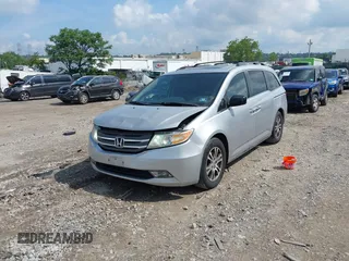 2012 Honda Odyssey EX-L with VIN 5FNRL5H61CB081634, listed as a IAAI auction lot 42760909 with 197,949 mi miles and . Bid and sale history available at DreamBid. Image 23.