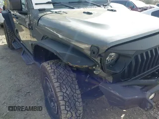 2019 Jeep Wrangler Unlimited Sport Altitude with VIN 1C4HJXDG3KW639148, listed as a IAAI auction lot 41933844 with 57,184 mi miles and . Bid and sale history available at DreamBid. Image 18.