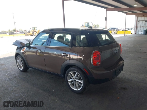 2012 MINI Countryman with VIN WMWZB3C51CWM04563, listed as a IAAI auction lot 42564564 with 95,760 mi miles and . Bid and sale history available at DreamBid. Image 3.