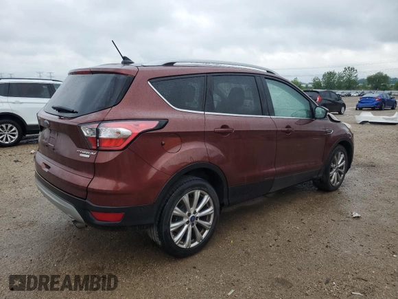 2018 Ford Escape Titanium z VIN 1FMCU0J93JUA70449, wystawiony jako Copart lot #59303245 z przebiegiem 165 907 mil mil oraz Szkoda całkowita • Salvage title. Historia ofert i sprzedaży dostępna na DreamBid. Obrazek 3.