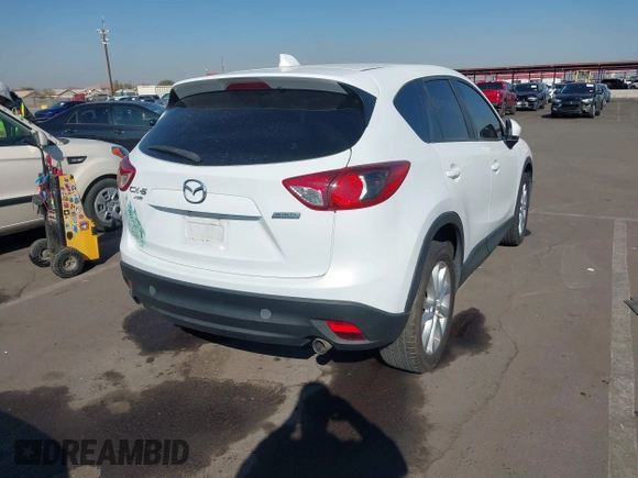 2014 Mazda CX-5 Grand Touring with VIN JM3KE4DY4E0375809, listed as a IAAI auction lot 41468078 with 151,226 mi miles. Bid and sale history available at carsss.com. Image 4.