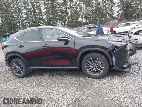2023 Lexus NX 350h Premium z VIN 2T2GKCEZ7PC013700, wystawiony jako IAAI lot #41765156 z przebiegiem 22 423 mil mil oraz . Historia ofert i sprzedaży dostępna na DreamBid. Obrazek 13.